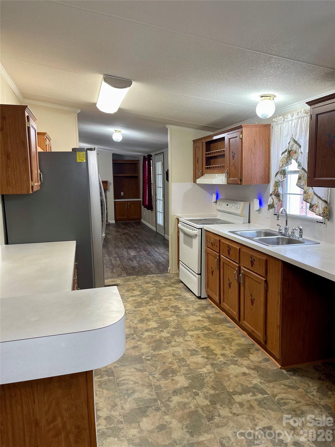 205 Star Road York, SC 29745 - Photo 5 of 15 a large kitchen with kitchen island a sink stainless steel appliances and cabinets