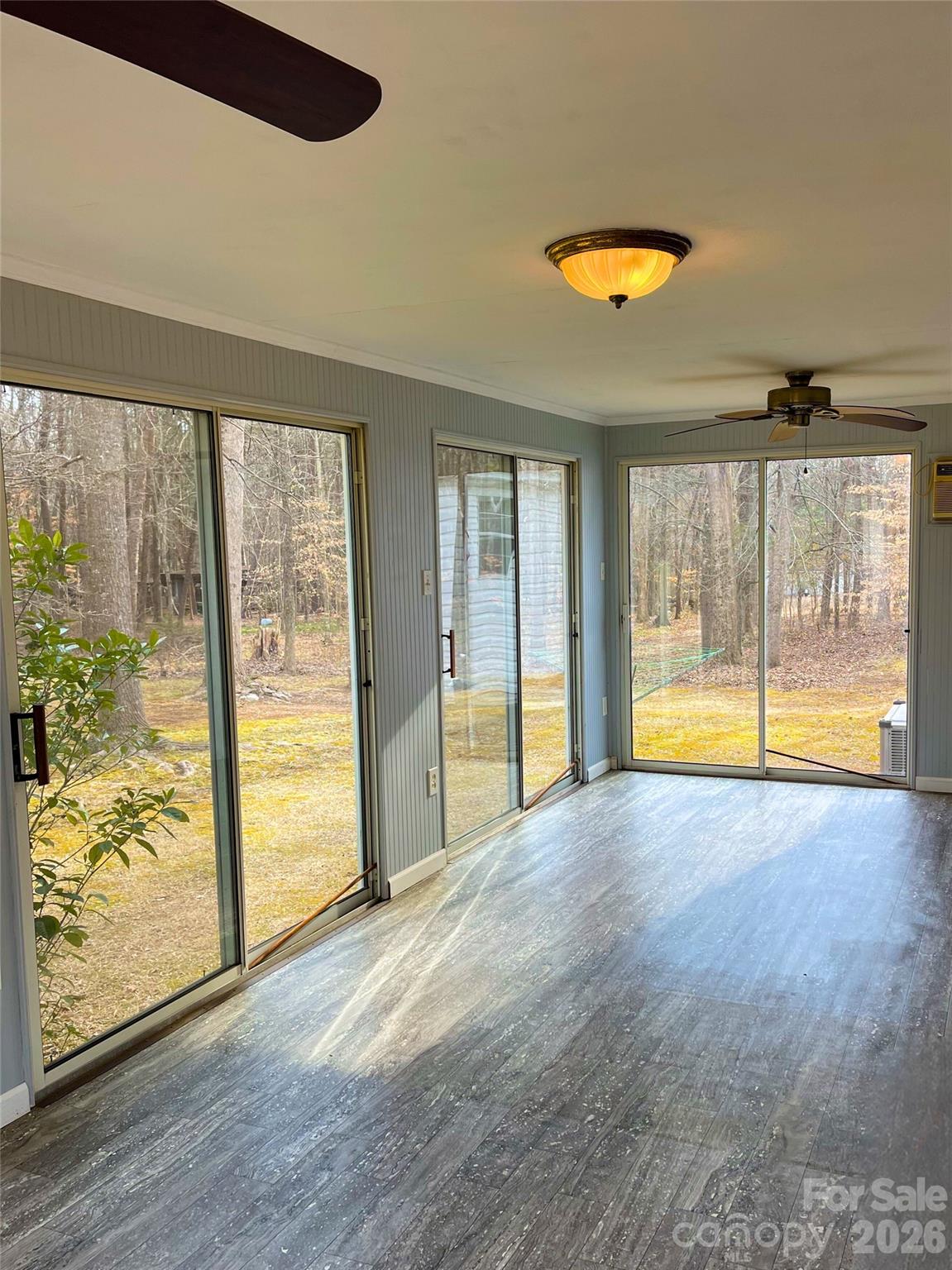205 Star Road York, SC 29745 - Photo 6 of 15 an empty room with wooden floor and windows
