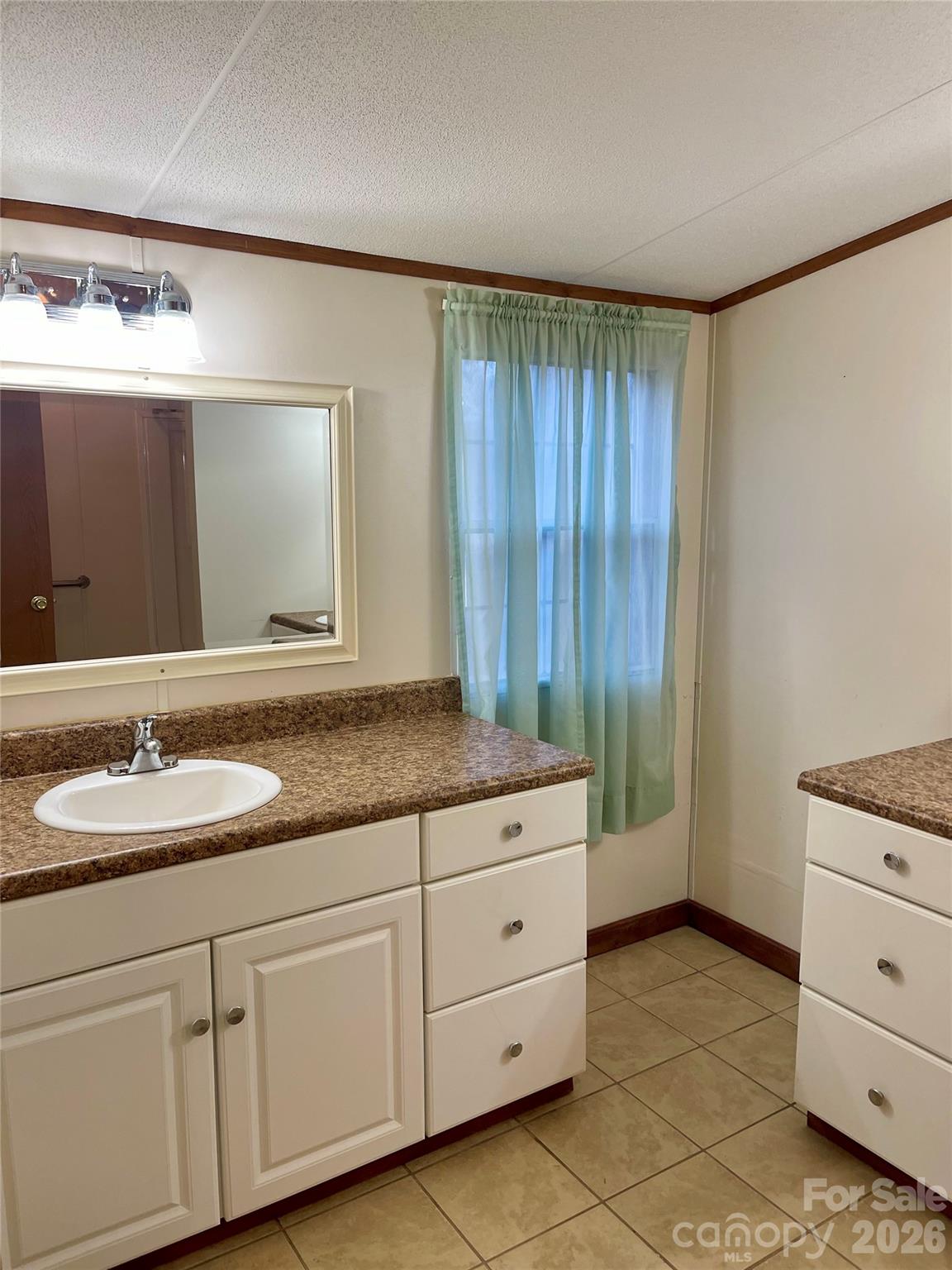 205 Star Road York, SC 29745 - Photo 9 of 15 a bathroom with a granite countertop sink and a mirror