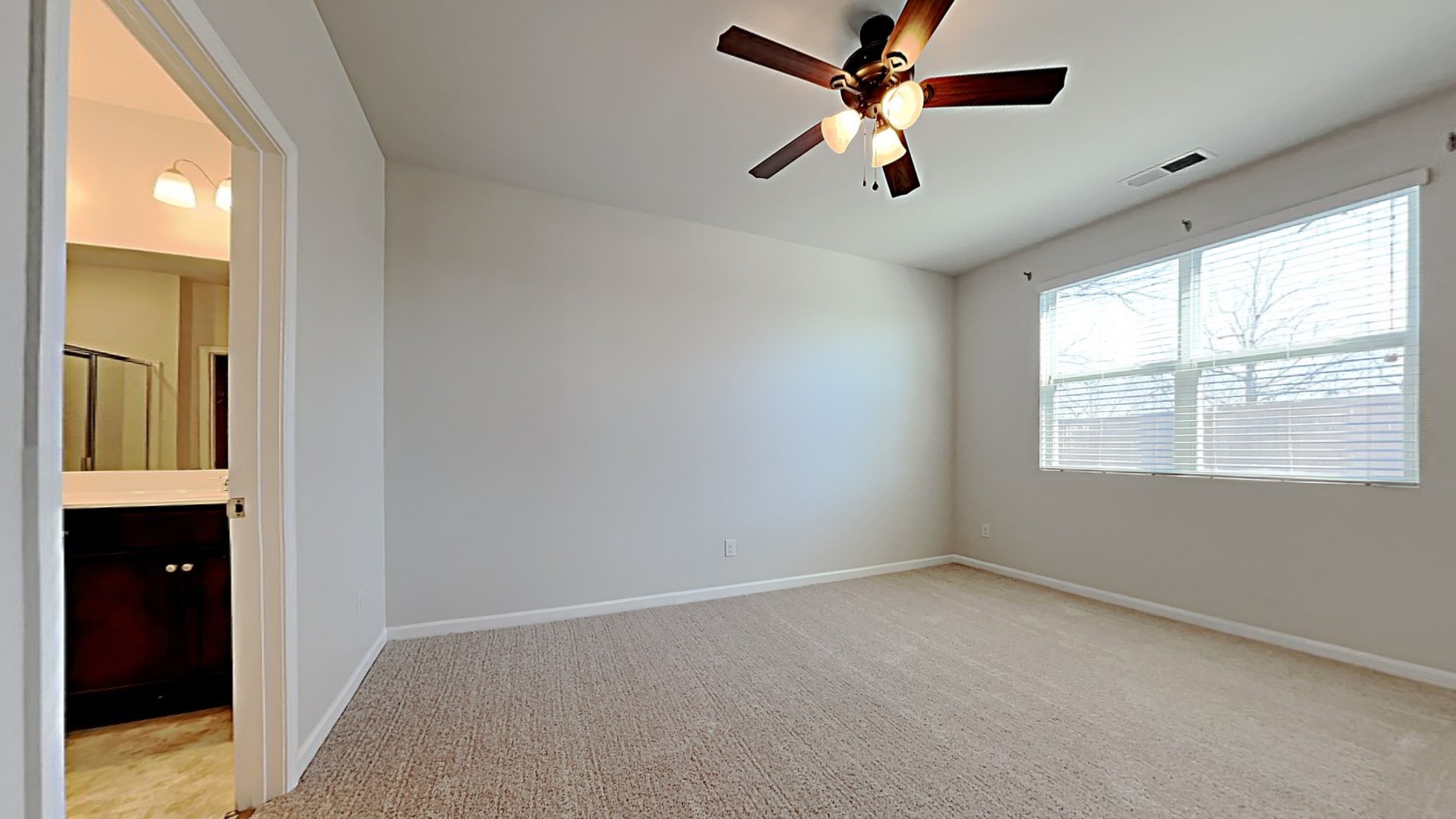 740 Prominence Road Columbia, TN 38401 - Photo 8 of 17 wooden floor in an empty room with a window