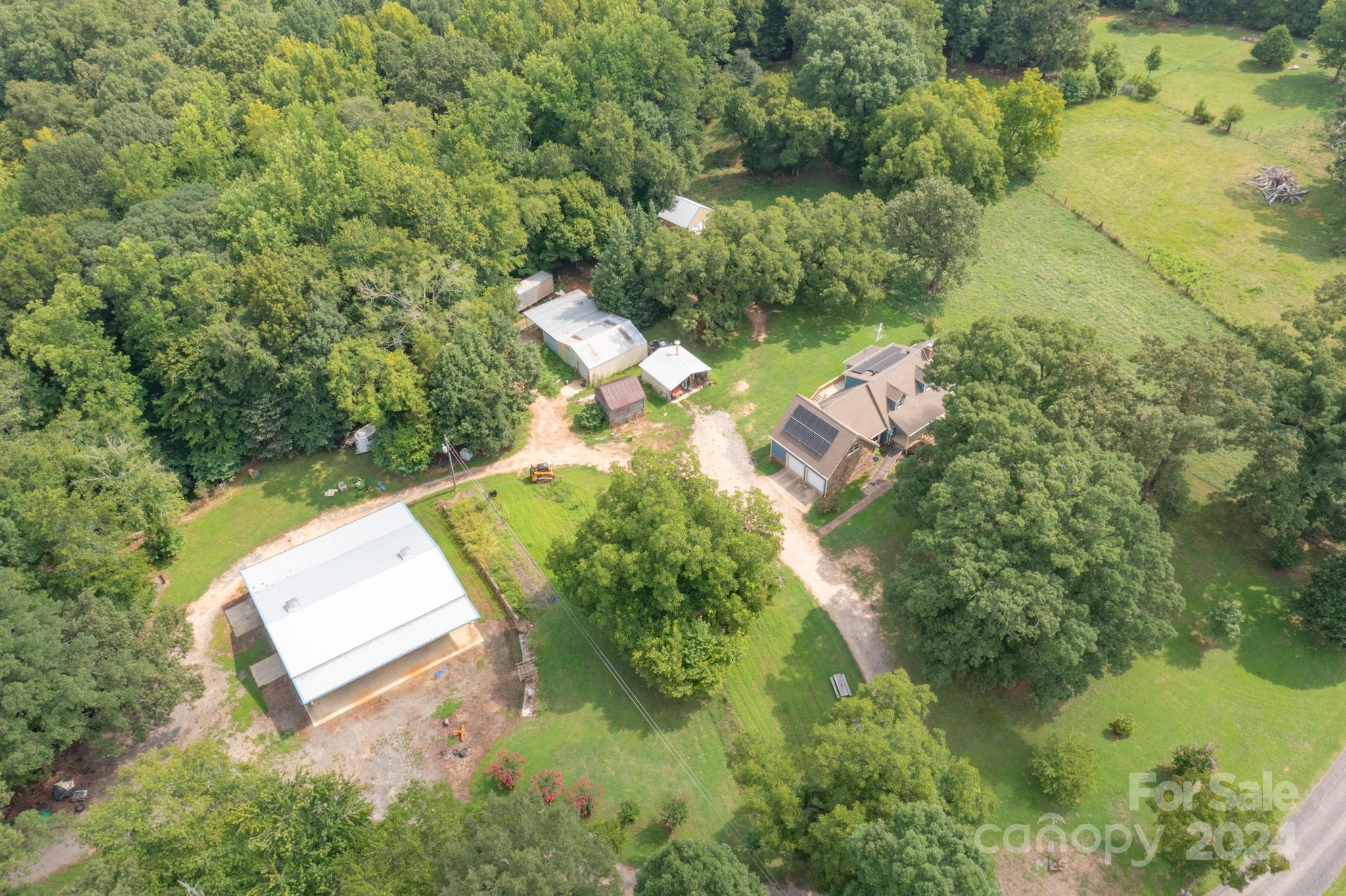 4120 Bookout Road Rock Hill, SC 29730 - Photo 14 of 47 an aerial view of a house with a yard and lake view