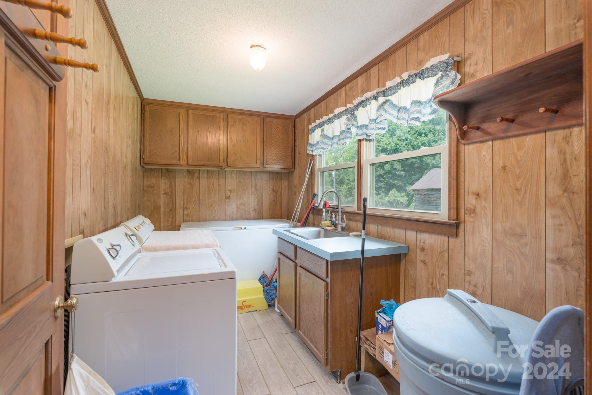 4120 Bookout Road Rock Hill, SC 29730 - Photo 24 of 47 a utility room with dryer washer and a view of living room