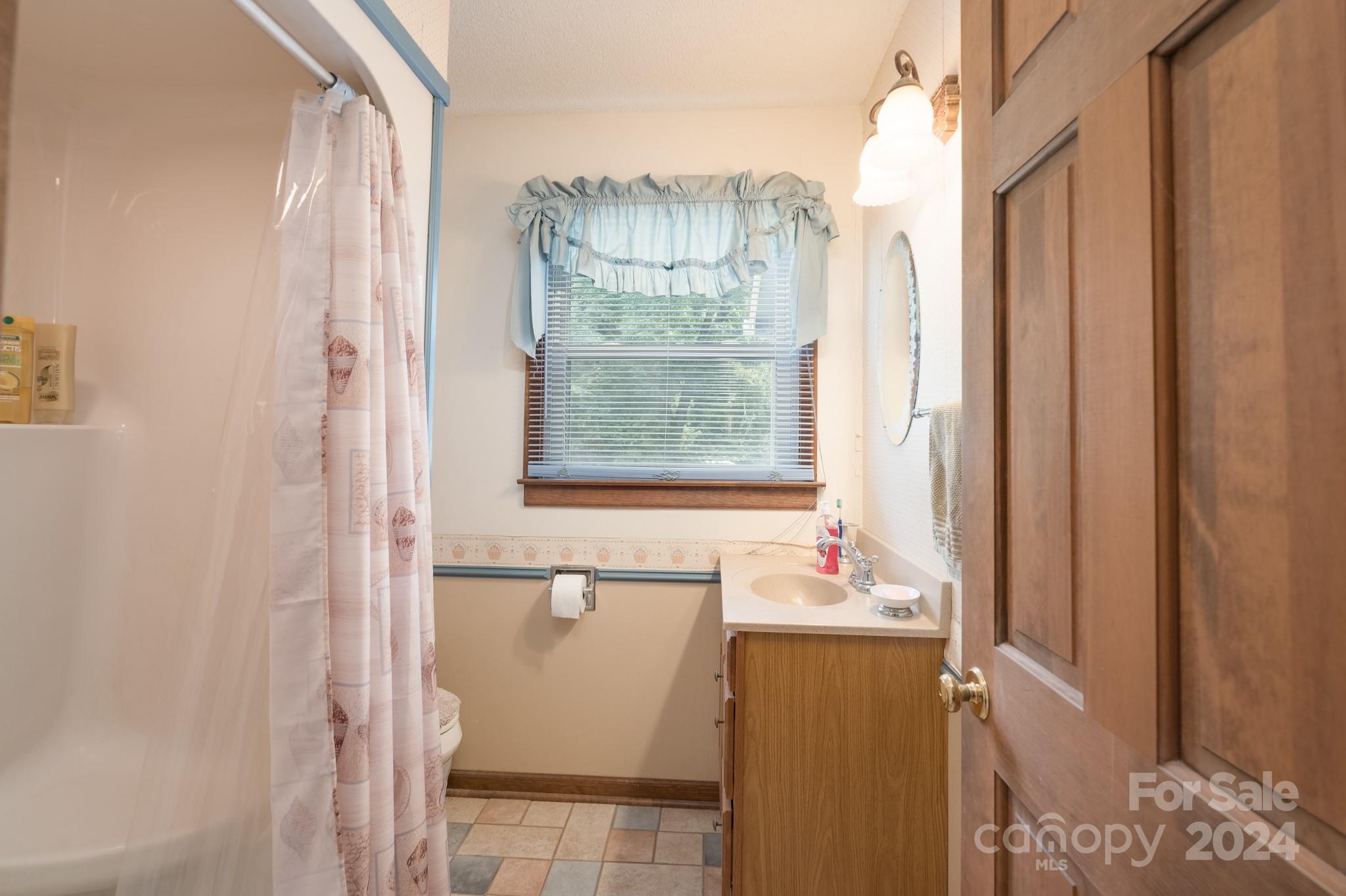 4120 Bookout Road Rock Hill, SC 29730 - Photo 25 of 47 a bathroom with a bathtub and shower