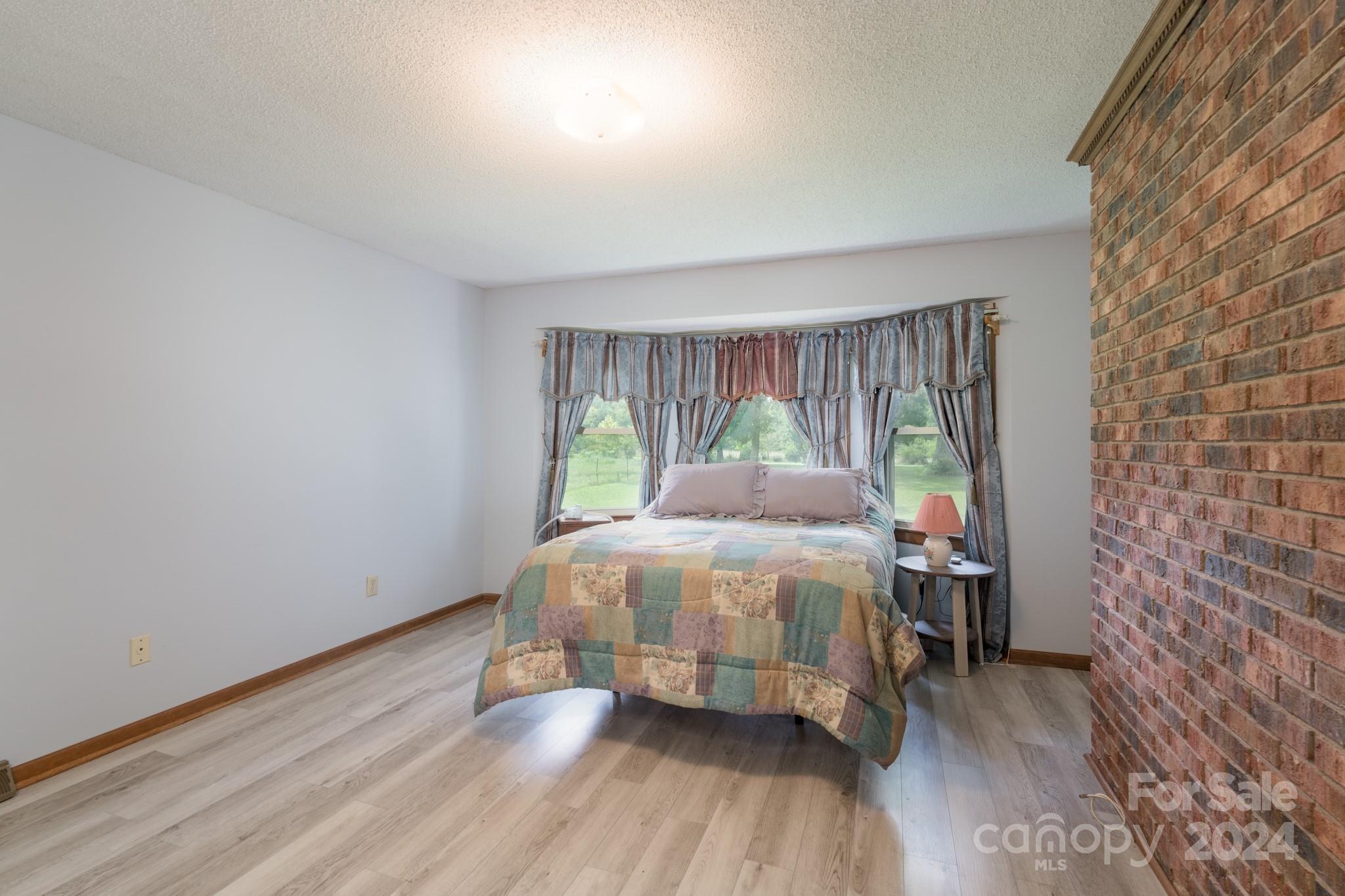 4120 Bookout Road Rock Hill, SC 29730 - Photo 28 of 47 a bedroom with a bed and a window