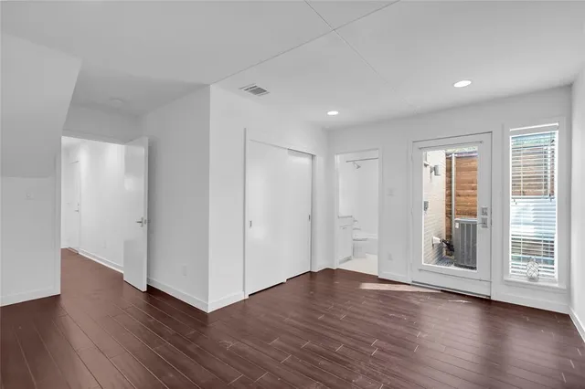 a view of a livingroom with wooden floor
