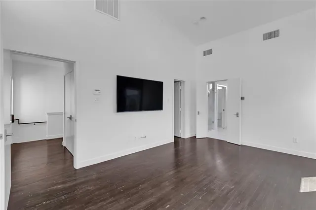 a view of a livingroom with wooden floor