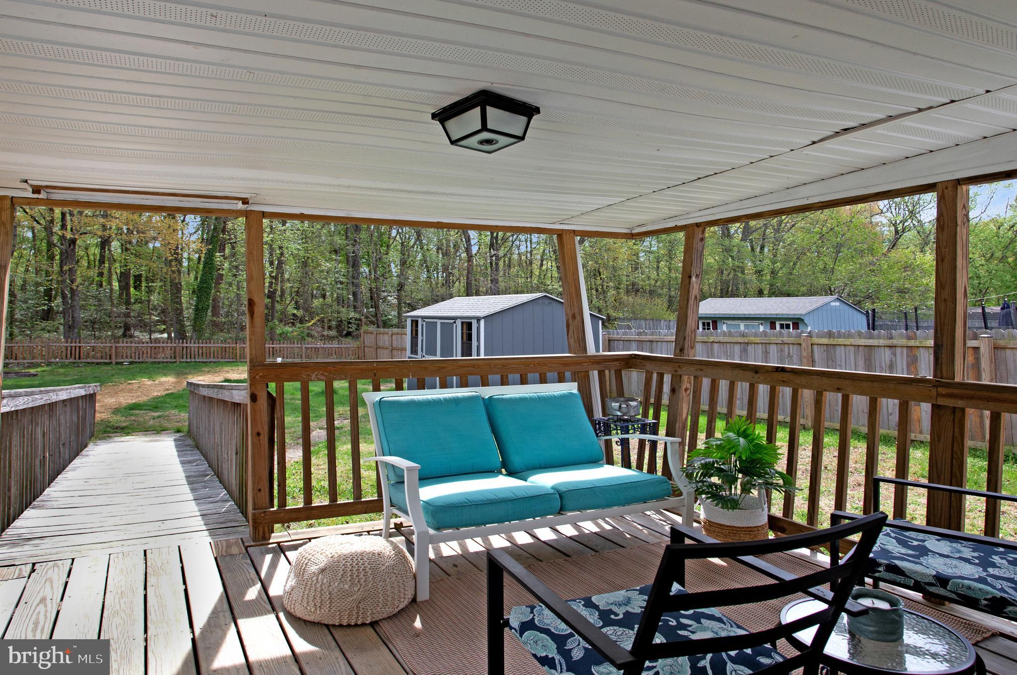 114 River Road Edgewater, MD 21037 - Photo 25 of 30 a balcony with furniture and a swing