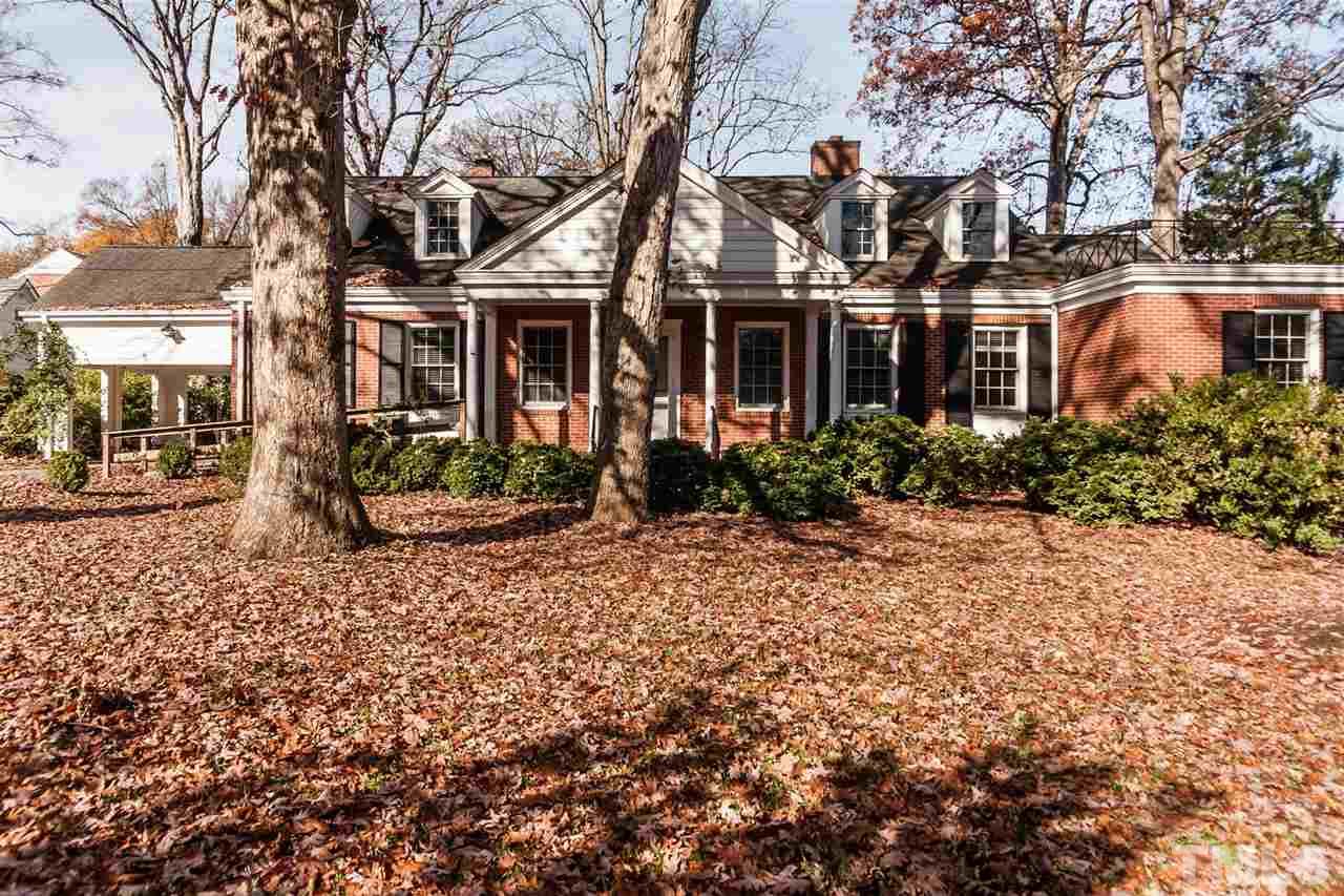 1707 Jarvis Street Raleigh, NC 27608 - Photo 1 of 25 a front view of a house with garden