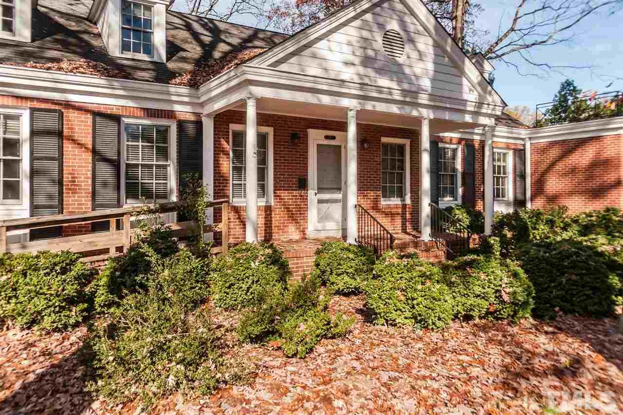 1707 Jarvis Street Raleigh, NC 27608 - Photo 2 of 25 front view of a house with a small yard