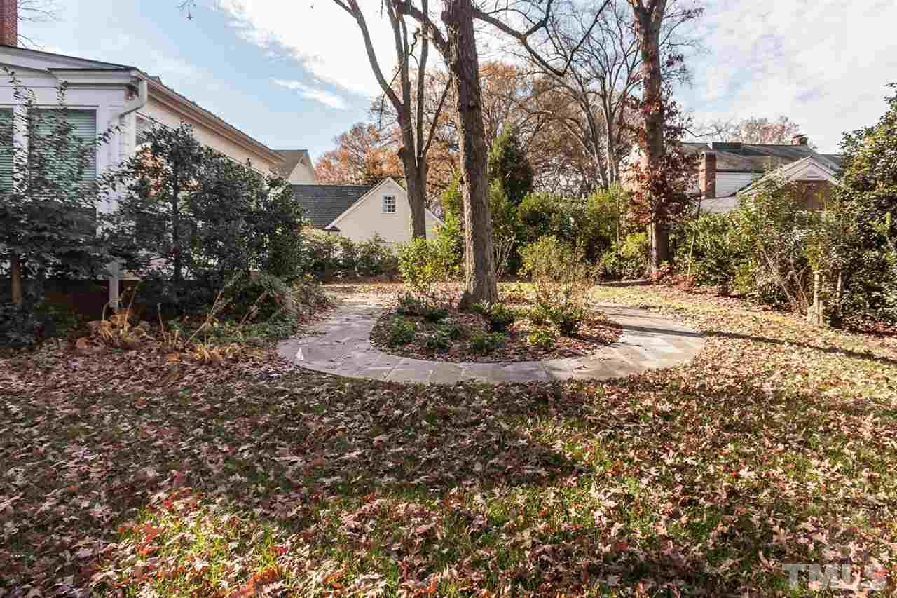 1707 Jarvis Street Raleigh, NC 27608 - Photo 23 of 25 a view of a yard with plants and trees