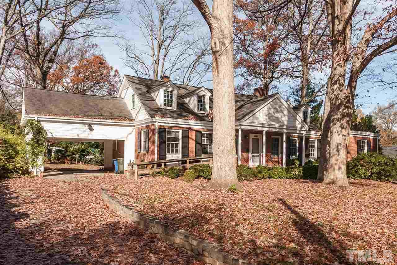 1707 Jarvis Street Raleigh, NC 27608 - Photo 25 of 25 a front view of a building with large trees