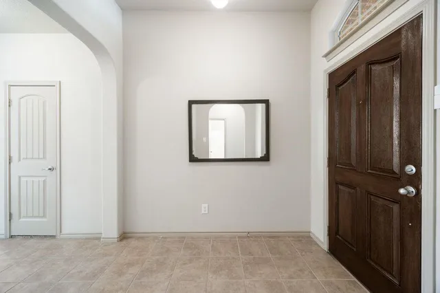a view of a kitchen with furniture and a fireplace