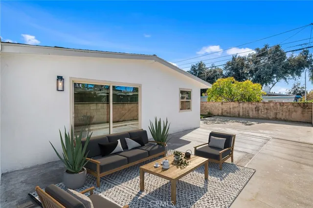 a building outdoor space with patio furniture