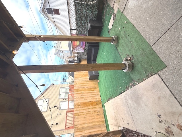 2115 West Barry Avenue, Unit CH Chicago, IL 60618 - Photo 15 of 15 a view of a balcony with floor to ceiling windows