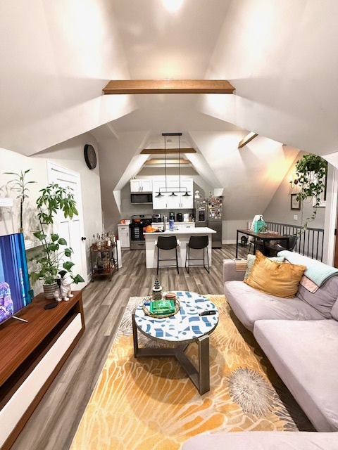 2115 West Barry Avenue, Unit CH Chicago, IL 60618 - Photo 3 of 15 a living room with furniture and a large window