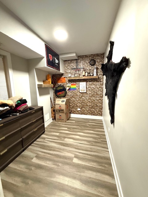 2115 West Barry Avenue, Unit CH Chicago, IL 60618 - Photo 10 of 15 a room with lots of white furniture and shower