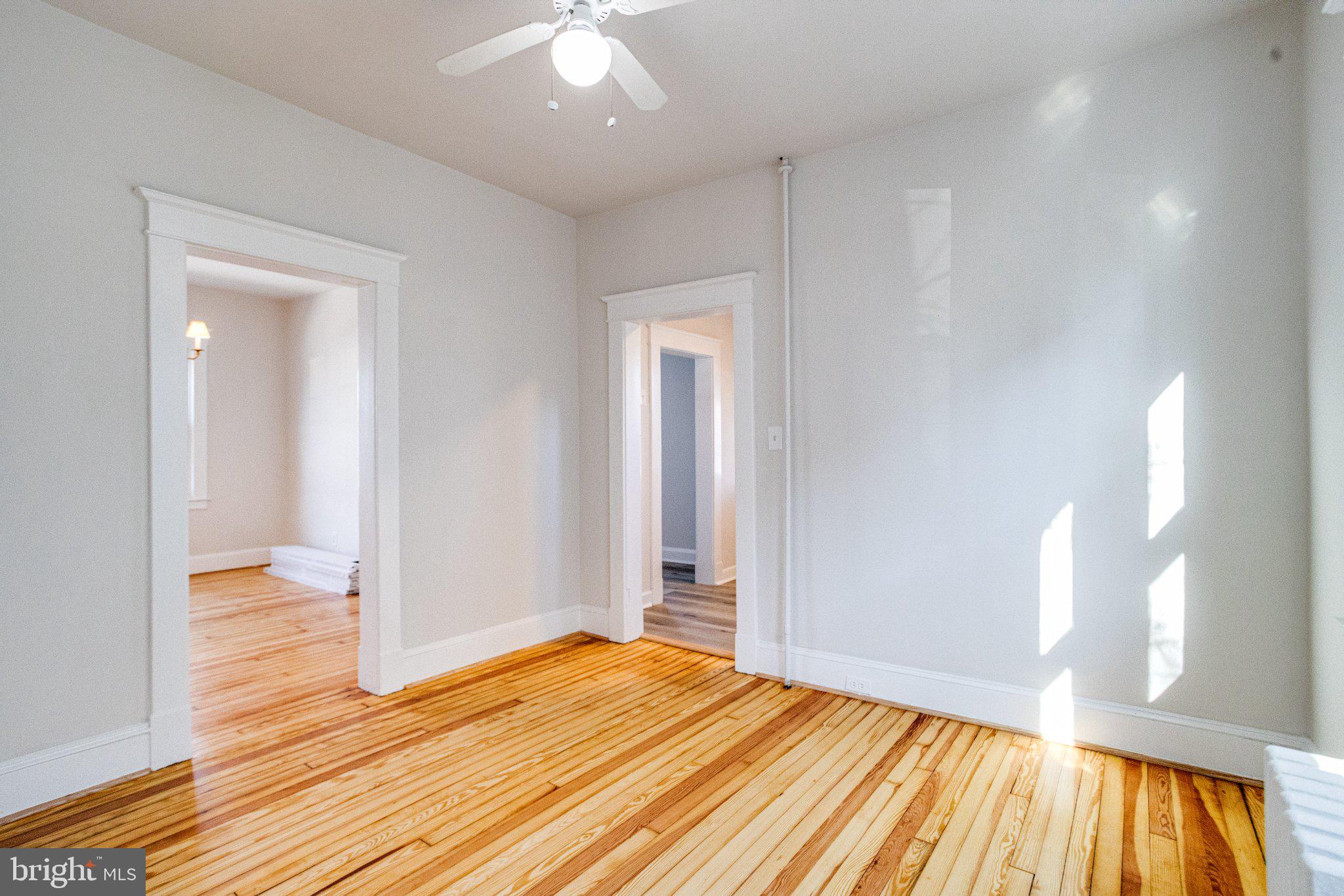 1813 Portship Road Dundalk, MD 21222 - Photo 21 of 50 Bright, airy space with warm wood floors.