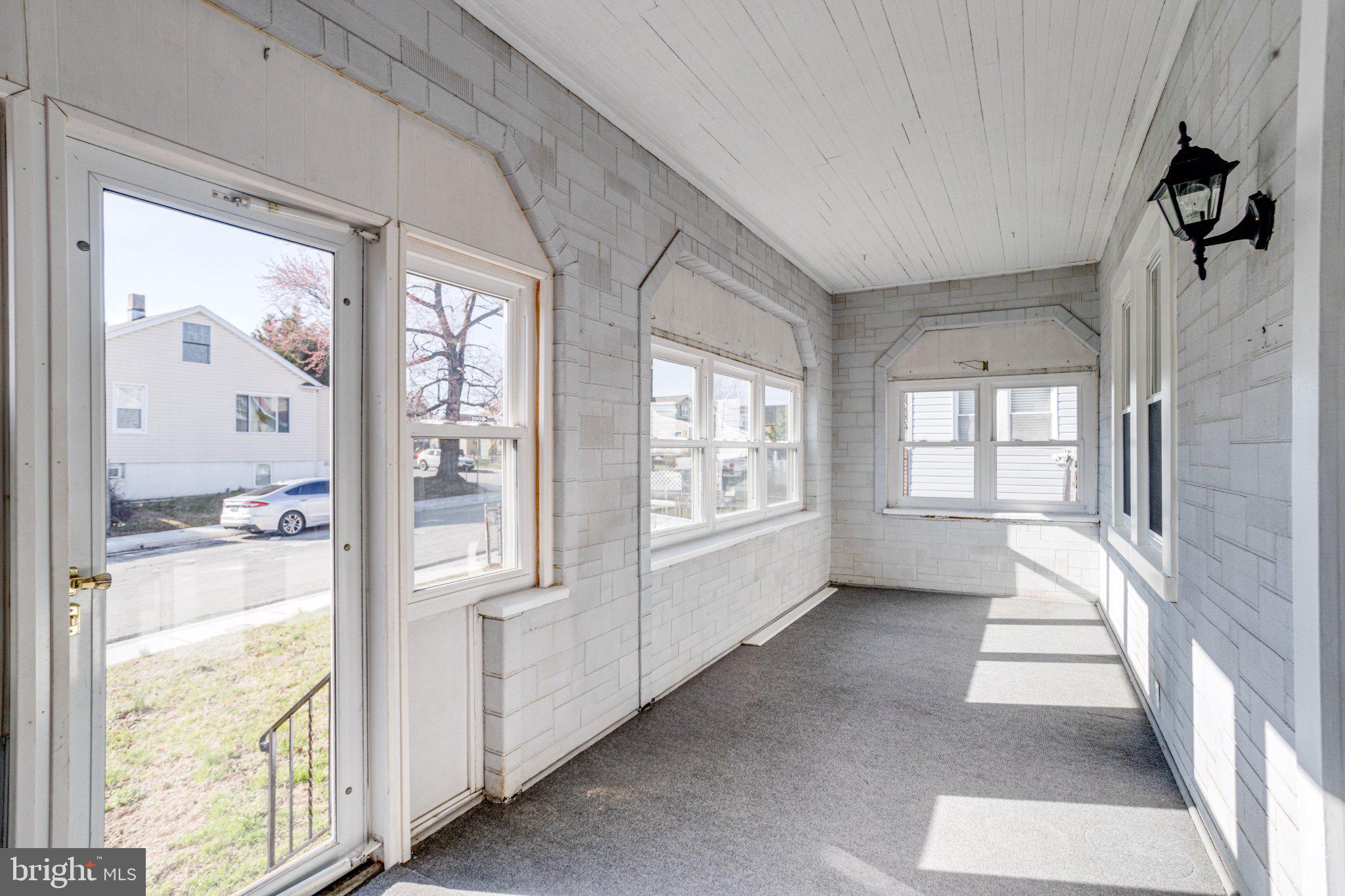 1813 Portship Road Dundalk, MD 21222 - Photo 3 of 50 Bright and airy sunroom retreat.