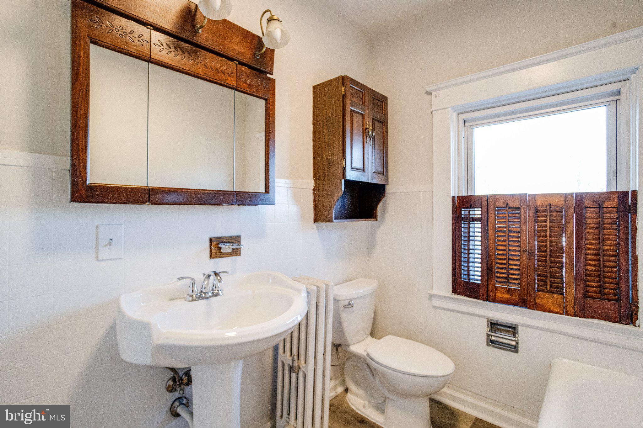 1813 Portship Road Dundalk, MD 21222 - Photo 42 of 50 Charming vintage bathroom with character.