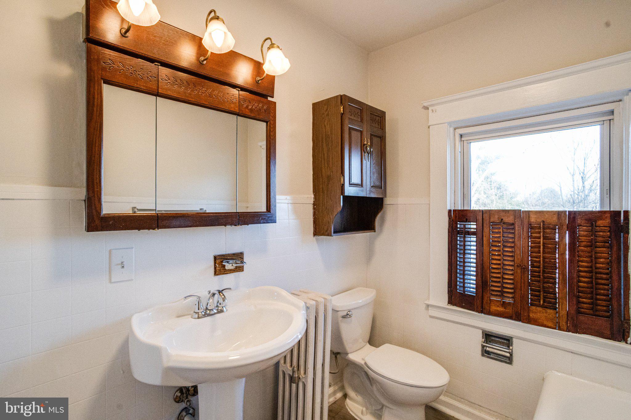 1813 Portship Road Dundalk, MD 21222 - Photo 43 of 50 Charming bathroom with vintage accents.