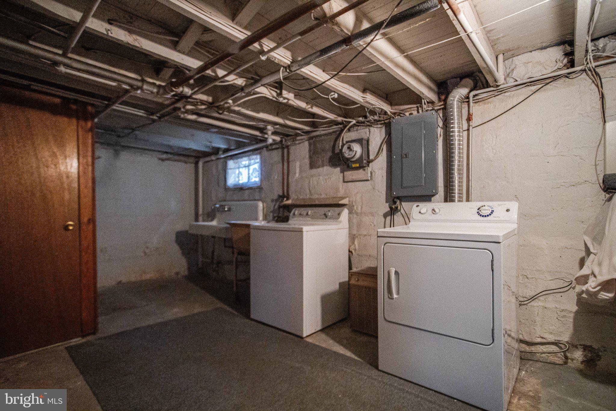 1813 Portship Road Dundalk, MD 21222 - Photo 47 of 50 Functional laundry space in the basement.