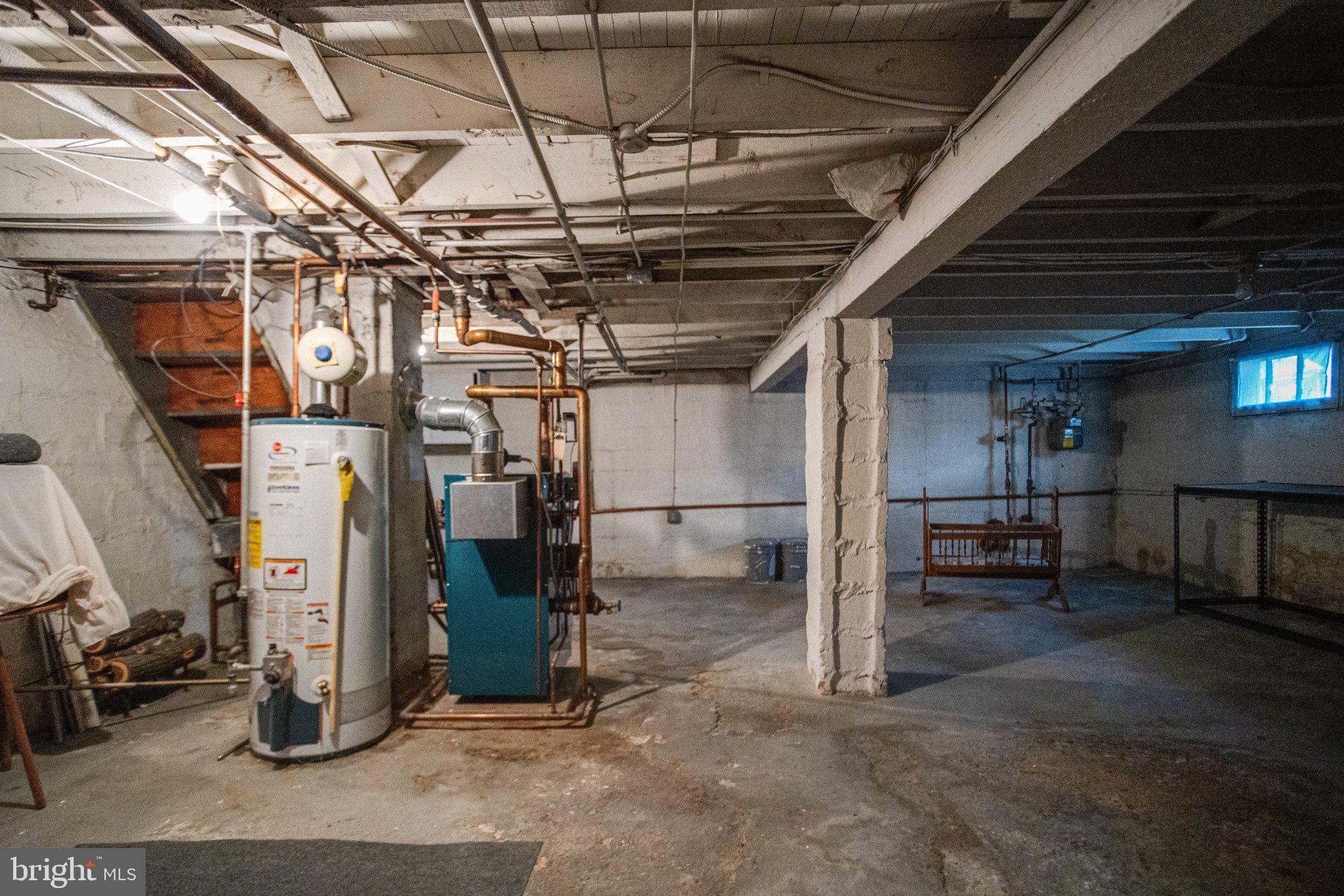 1813 Portship Road Dundalk, MD 21222 - Photo 49 of 50 Spacious basement with utility features.