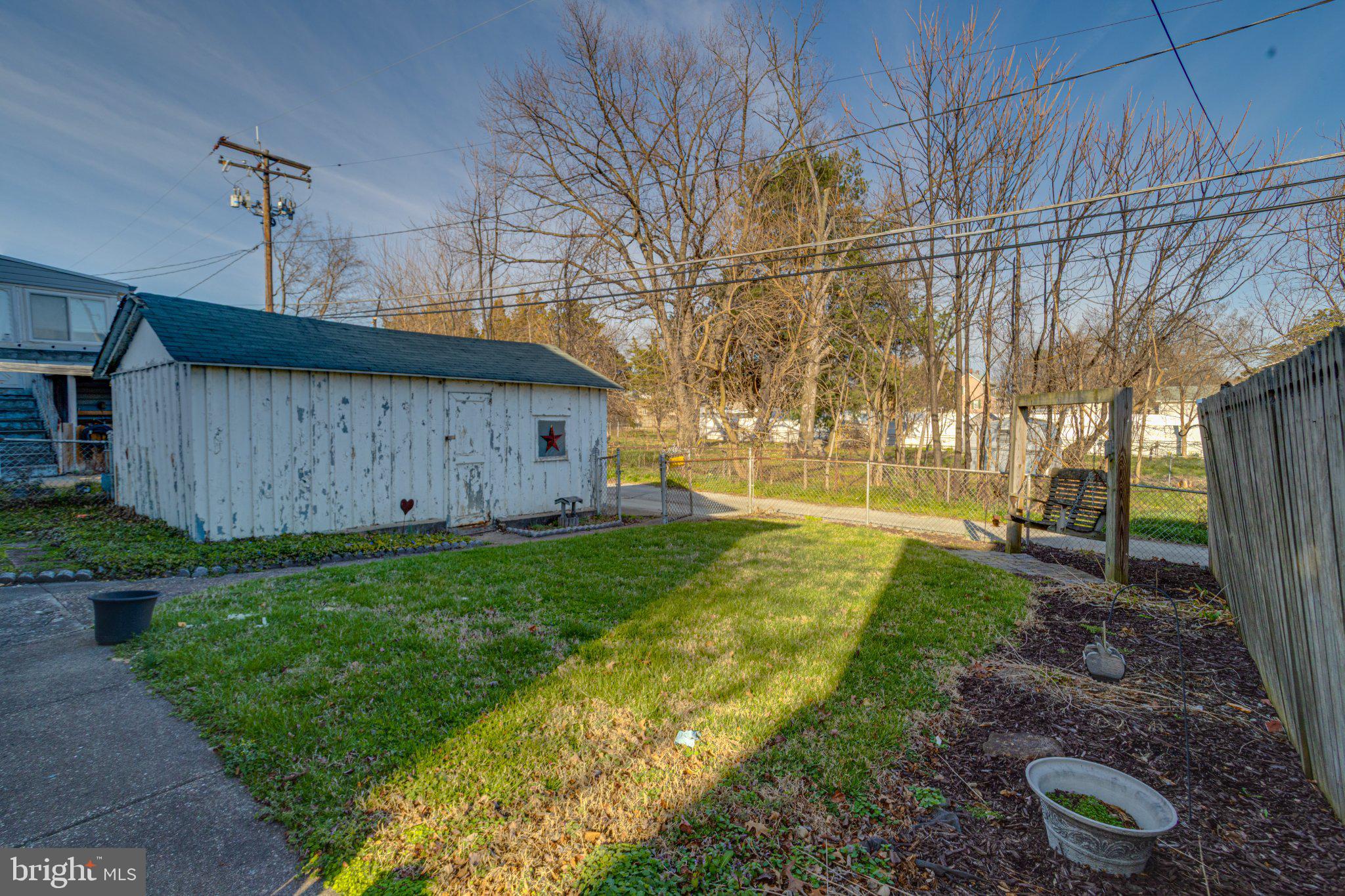1813 Portship Road Dundalk, MD 21222 - Photo 50 of 50 Charming backyard with rustic shed.