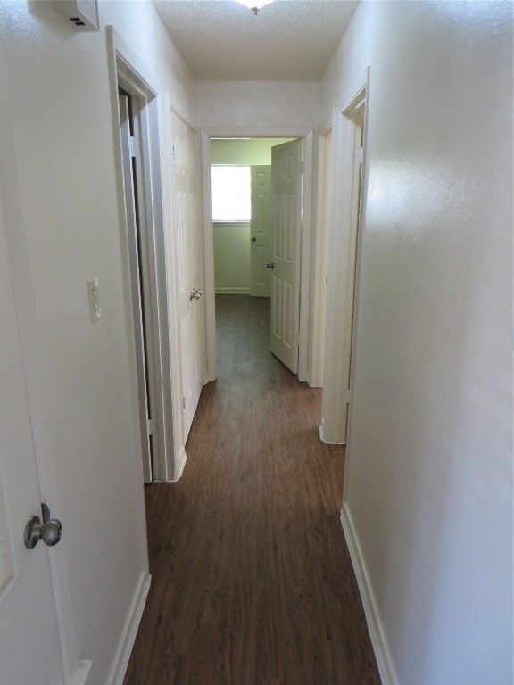 812 Ranch Road, Unit B Georgetown, TX 78628 - Photo 14 of 31 a view of a hallway with wooden floor