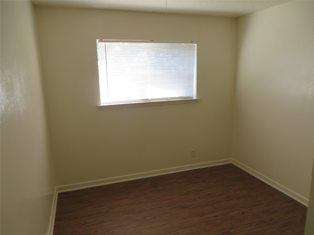 812 Ranch Road, Unit B Georgetown, TX 78628 - Photo 15 of 31 an empty room with a window