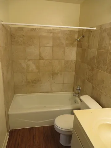 a bathroom with a sink and a bathtub