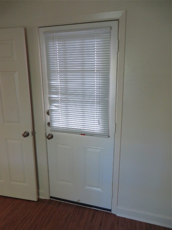 812 Ranch Road, Unit B Georgetown, TX 78628 - Photo 28 of 31 a view of an empty room with wooden floor and a window