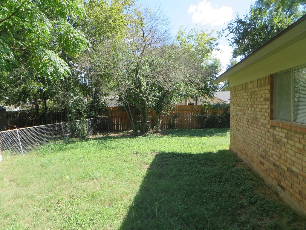 812 Ranch Road, Unit B Georgetown, TX 78628 - Photo 29 of 31 a view of a backyard with a small cabin