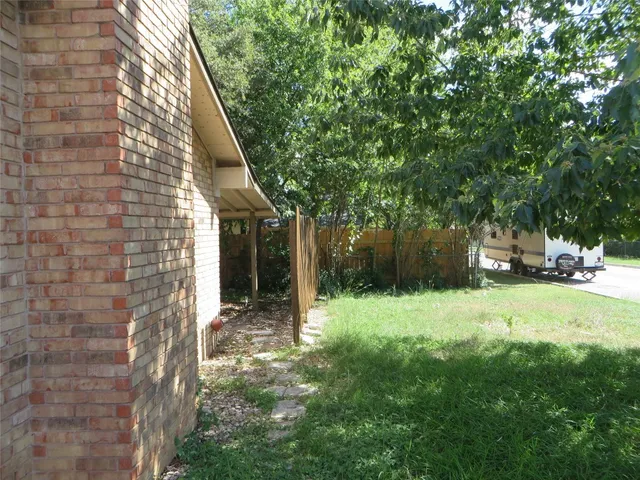 a backyard of a house with lots of green space