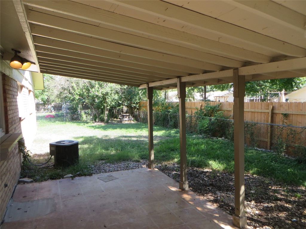 812 Ranch Road, Unit B Georgetown, TX 78628 - Photo 5 of 31 a view of backyard with plants and garden