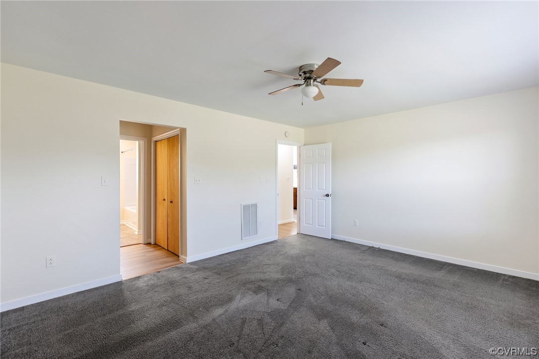 4540 Powhatan Lakes Road Powhatan, VA 23139 - Photo 14 of 23 a view of room with a ceiling fan and window
