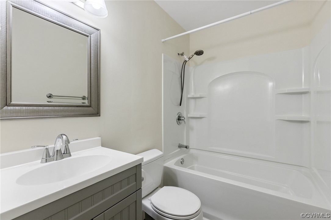 4540 Powhatan Lakes Road Powhatan, VA 23139 - Photo 20 of 23 a bathroom with a sink toilet and shower