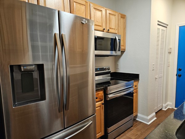 175 Boardtown Road Ellijay, GA 30540 - Photo 14 of 29 a metallic refrigerator freezer sitting in a kitchen
