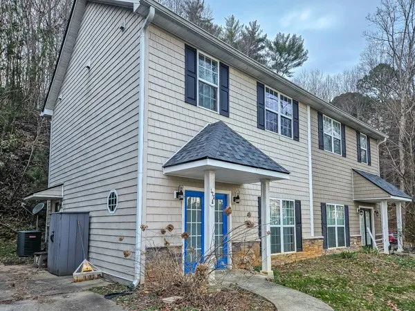 a front view of a house with porch