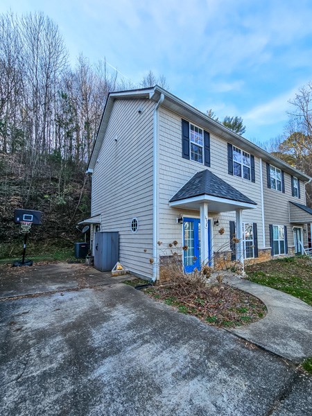 175 Boardtown Road Ellijay, GA 30540 - Photo 7 of 29 a view of a house with yard and sitting area