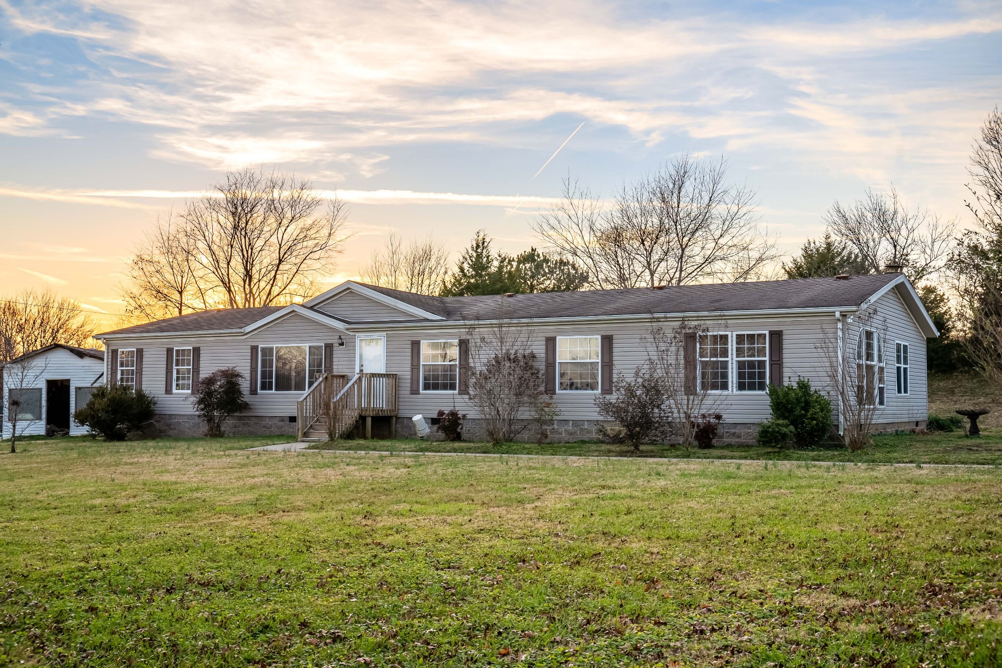 7363 Deer Ridge Road Fairview, TN 37062 - Photo 1 of 24 a front view of a house with a yard