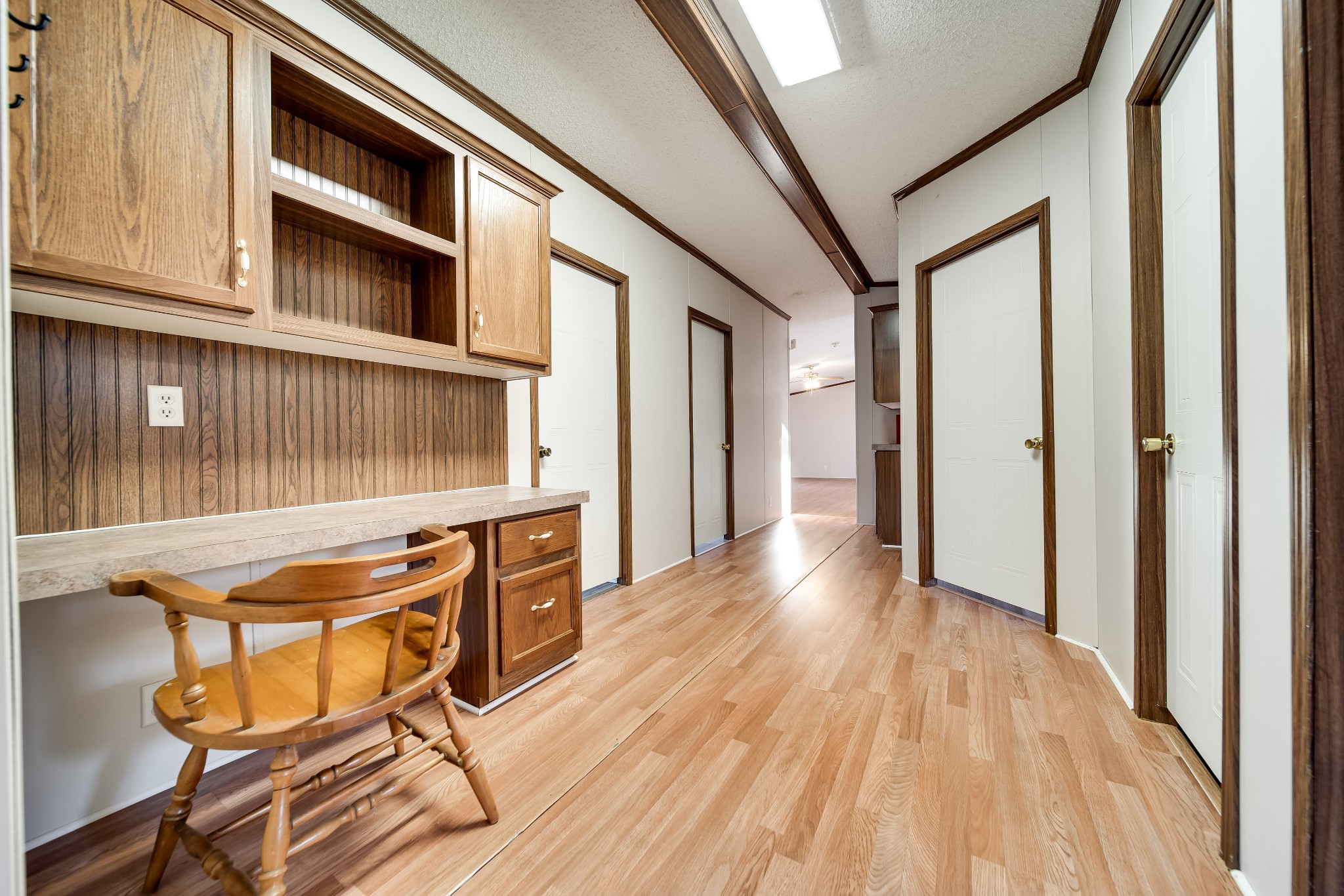 7363 Deer Ridge Road Fairview, TN 37062 - Photo 15 of 24 a view of a hallway with wooden floor and staircase