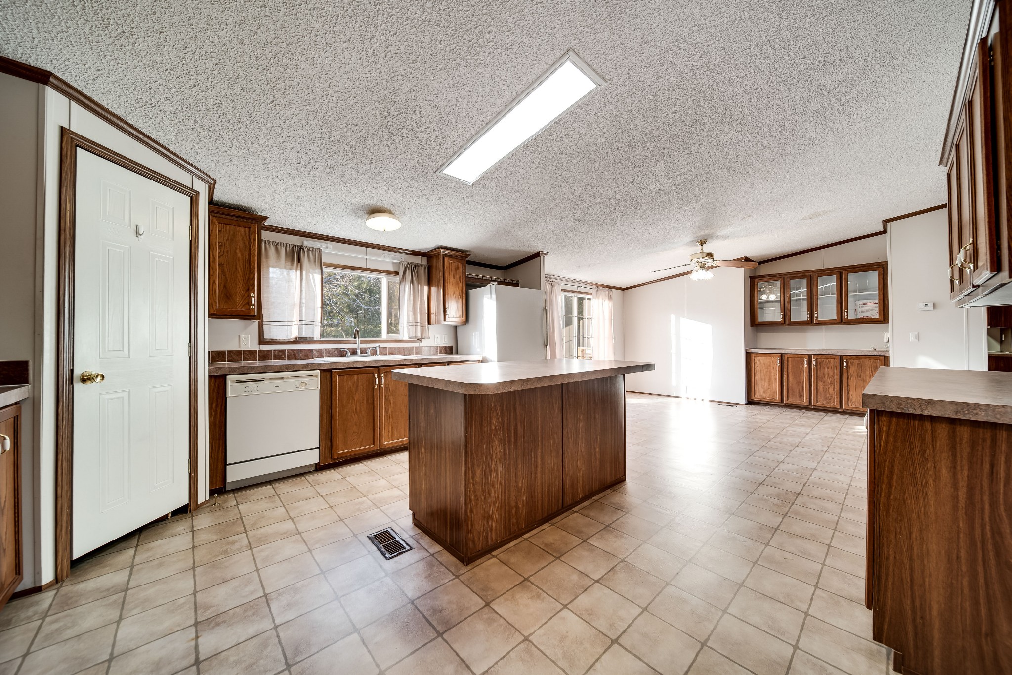 7363 Deer Ridge Road Fairview, TN 37062 - Photo 9 of 24 a kitchen with stainless steel appliances granite countertop a refrigerator and a sink