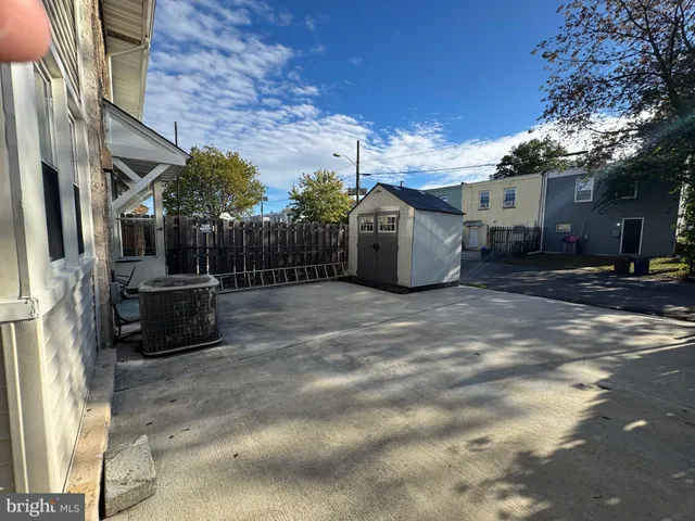 a view of a house with a street