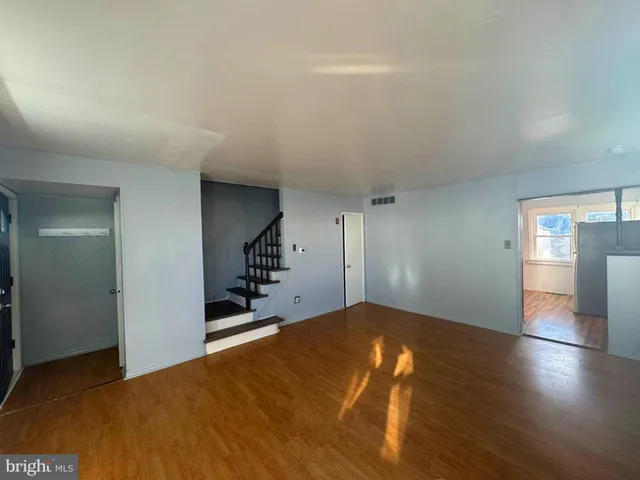 a view of a livingroom with a hard wood floor