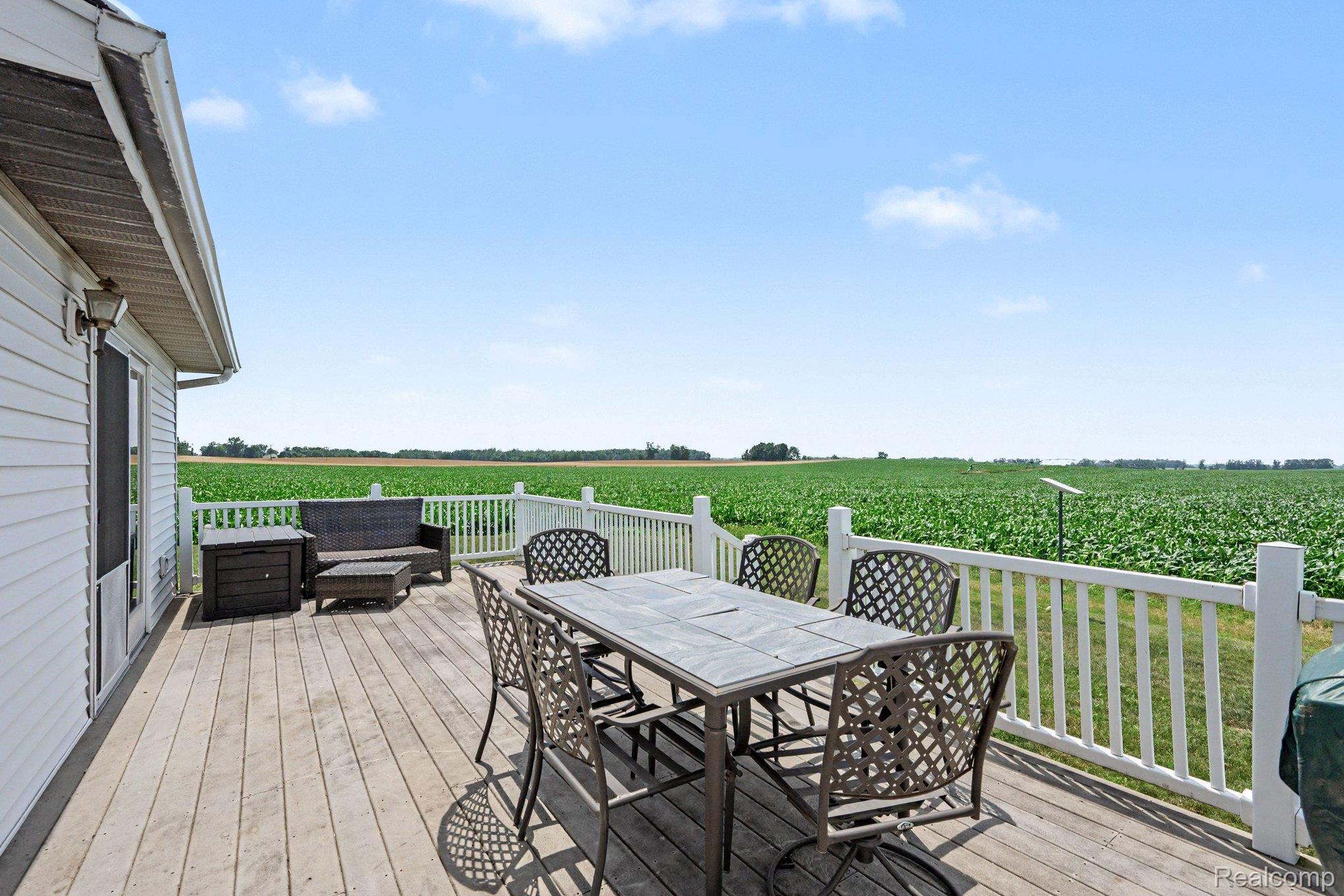 996 Arbogast Road Union City, MI 49094 - Photo 22 of 34 Spacious outdoor deck with wood-finish flooring and white railing