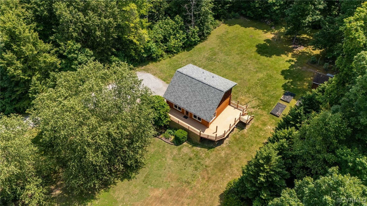 4285 Hadensville Farm Road Mineral, VA 23117 - Photo 2 of 32 an aerial view of a house with swimming pool and large trees