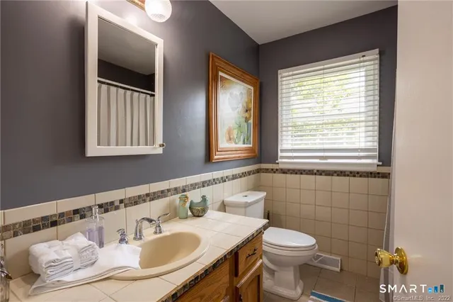 a bathroom with a sink and a toilet