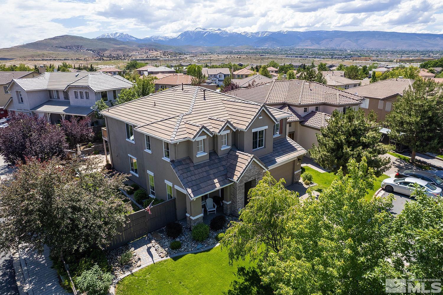 570 Alydar Court Reno, NV 89521 - Photo 3 of 40 an aerial view of residential houses with outdoor space and ocean view