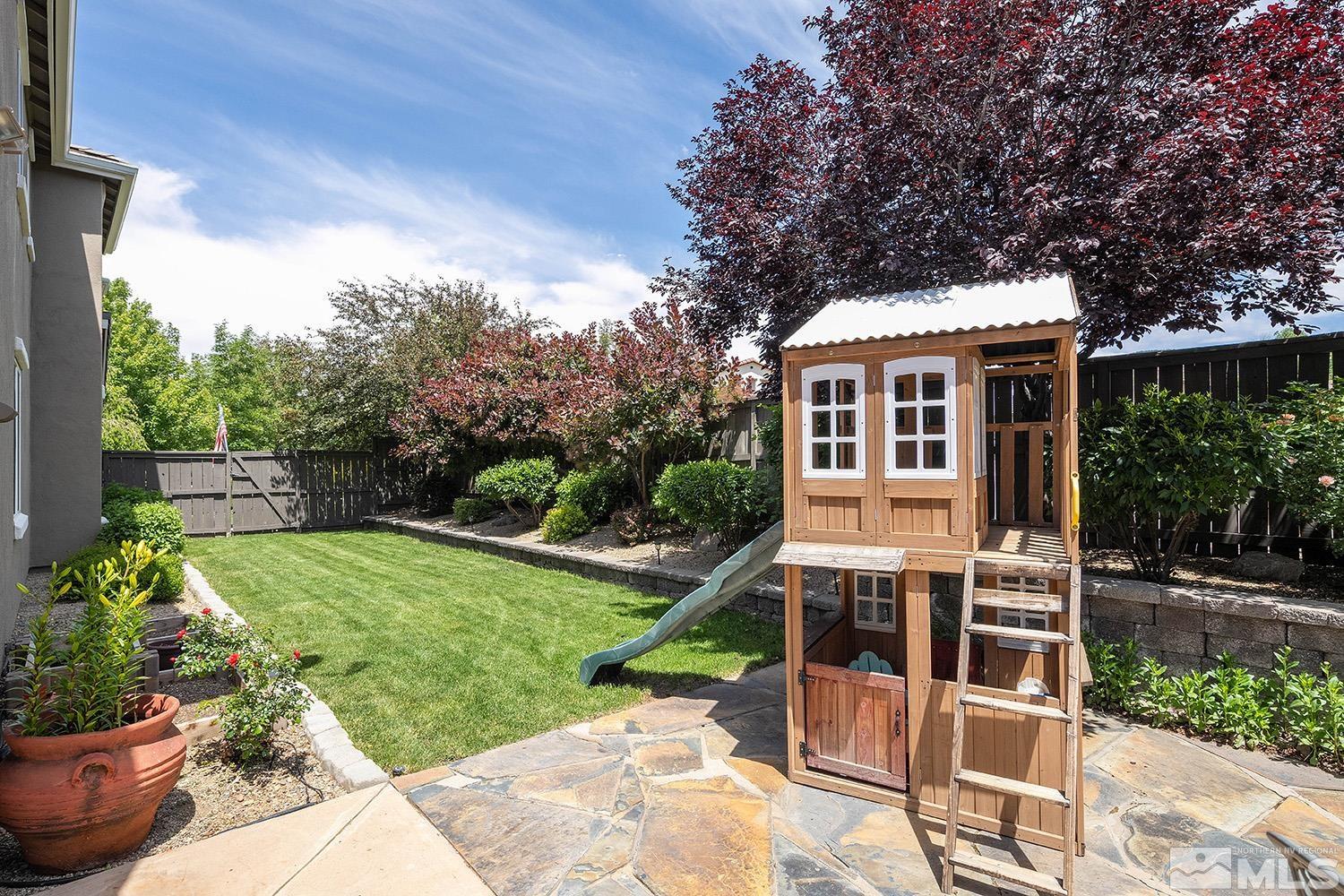 570 Alydar Court Reno, NV 89521 - Photo 34 of 40 a house view with a garden space