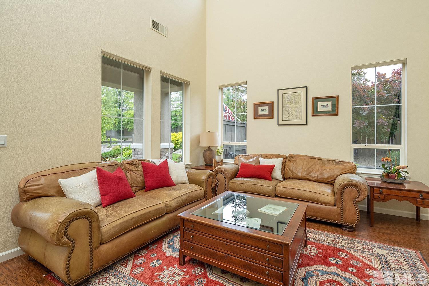 570 Alydar Court Reno, NV 89521 - Photo 5 of 40 a living room with furniture and a large window